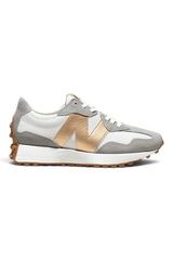 Sporline New Balance W3279NT kadın spor ayakkabı, gri süet ve beyaz detaylı, yan tarafında altın rengi N logosu.