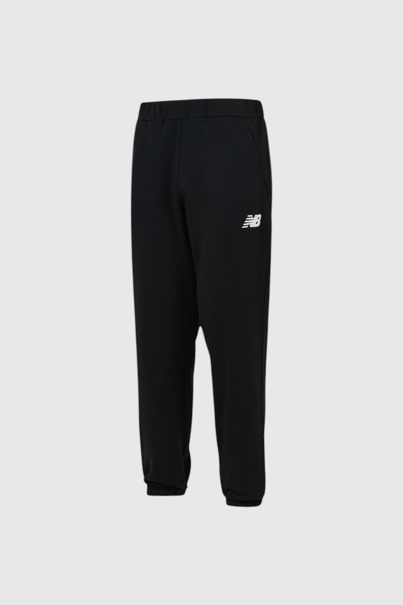 Sporline New Balance MNP1642 siyah erkek eşofman altı, beyaz logolu rahat kesim günlük spor pantolon
