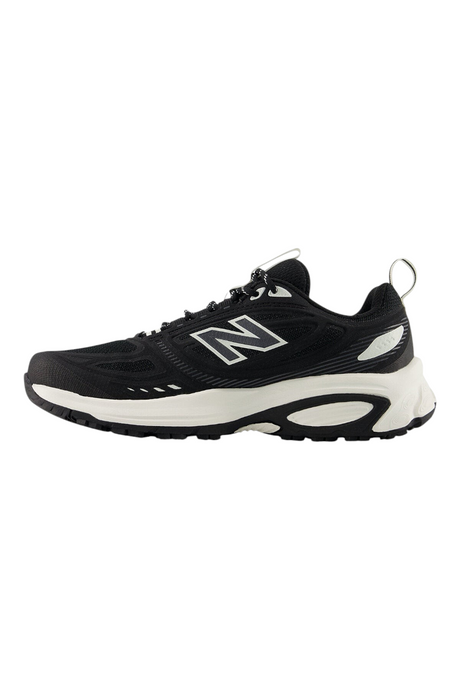 Sporline New Balance W410S siyah kadın spor ayakkabı, yan profil görünümü, file detaylı ve beyaz tabanlı tasarım