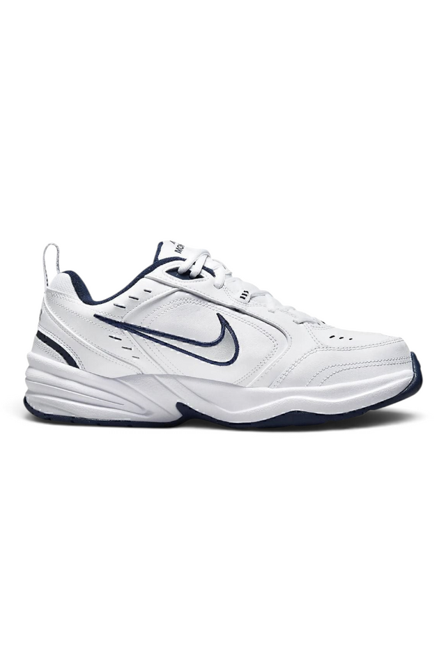Sporline Nike Air Monarch IV beyaz ve lacivert detaylı erkek spor ayakkabı, yan profil görünümü